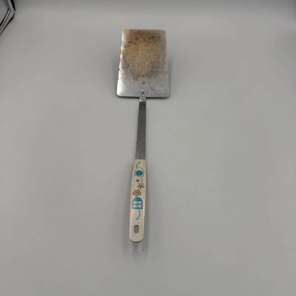 Vintage Household Japan Deluxe Spatula Heraldic Crest White Handle Stainless